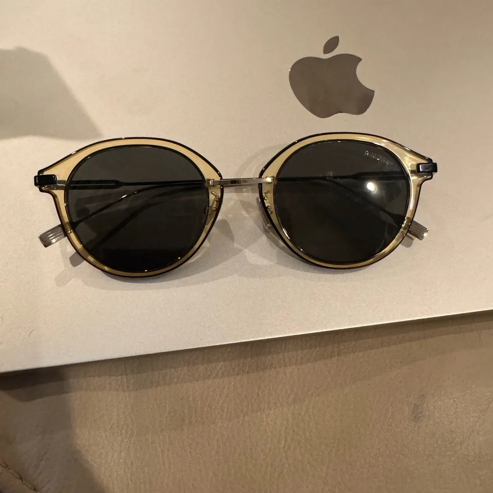 Round Black and Tan Sunglasses